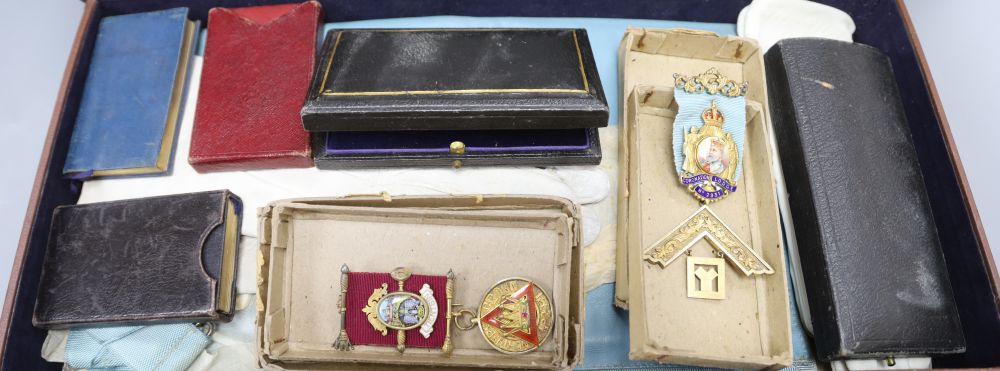 A collection of Masonic regalia including five silver medals (jewels)